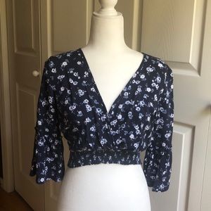 Cross draped crop top.